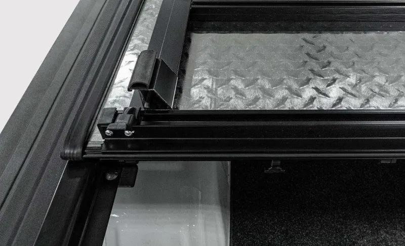 Lomax B3010029 Hard Tri-Fold Truck Bed Cover With Split-Rail Design And Matte Black Urethane Coating 1